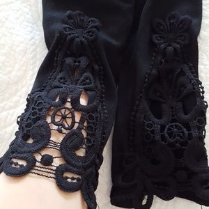 Leggings with crochet detail on the bottom.